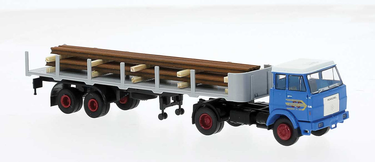 PREORDER Brekina HO 82264 Henschel F221S Tractor with Stake Flatbed Trailer & Pipe Load, Assembled, G&G (blue, gray)